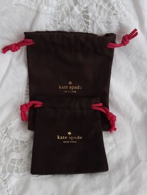 Kate Spade brown and pink jewelry pouches